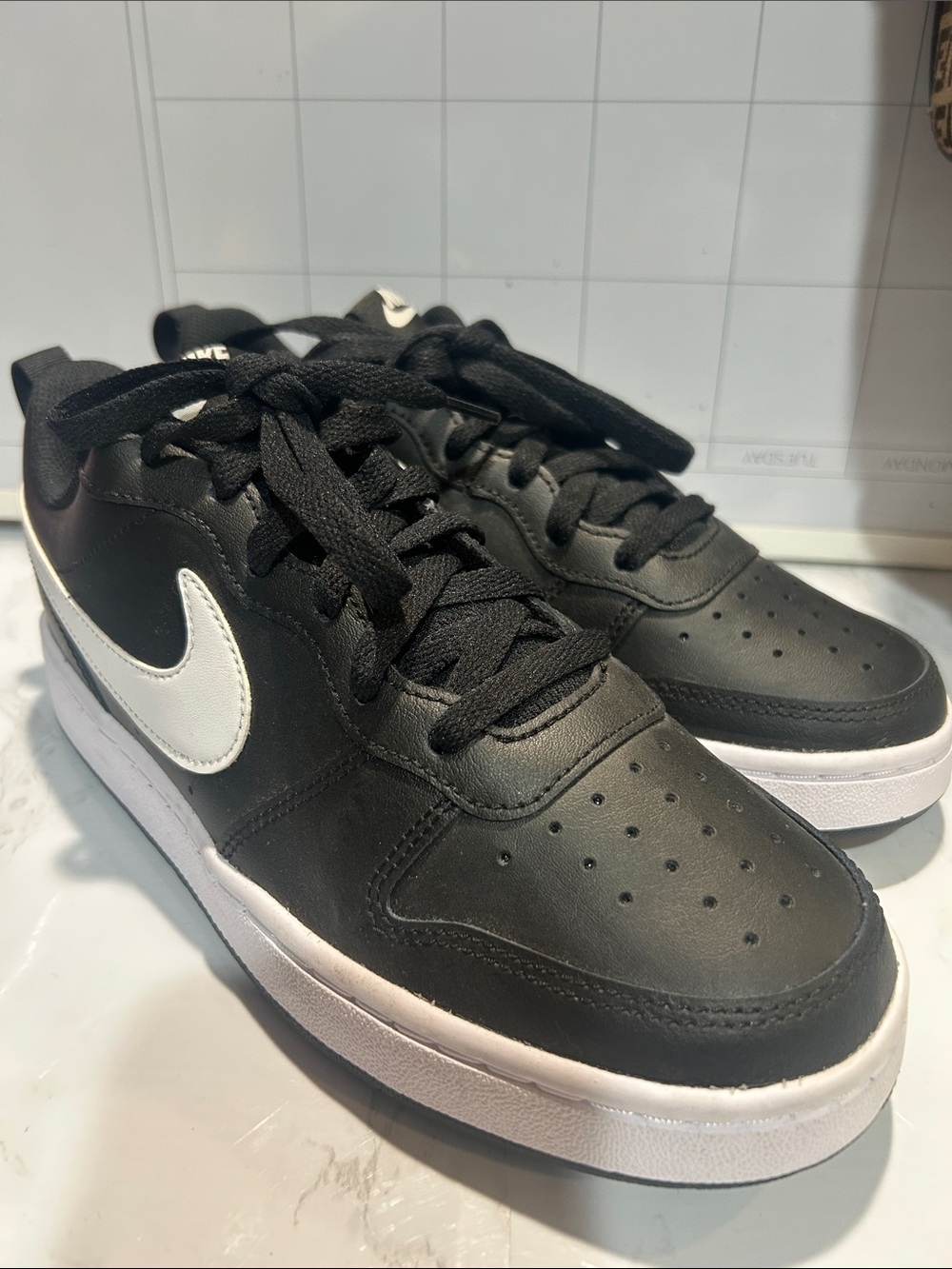 Nike Court Vision Low black and white sneakers